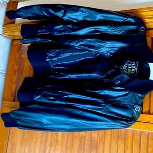 Black Color. Style motorcycle jacket.